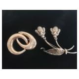 Pair of sterling silver brooches