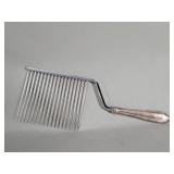 Sterling silver handle cake comb