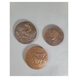 Three vintage bronze medals