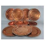 Ten vintage copper and brass chargers