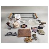 Box of misc desk ornaments, belt buckle, etched