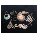 Group of single sterling silver earrings