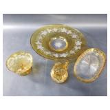 Vintage etched amber glass bowls, stemware, and