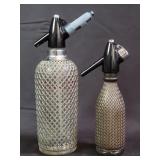 Pair of wire-mesh-wrapped seltzer bottles