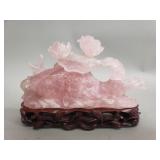 Carved pink rose quartz Koi sculpture