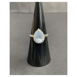 Sterling silver ring with light blue cubic