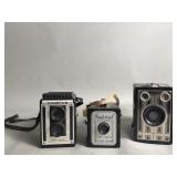 3 Vintage cameras and two clocks