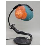 Art Nouveau style cast iron table lamp featuring