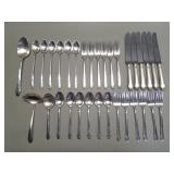 33 piece International sterling flatware