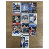 Lots of Steph Curry basketball cards