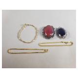 Pair of sterling silver brooches, and 3