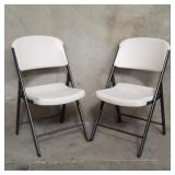 Pair of Lifetime plastic folding chairs