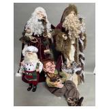 Group of Santa Claus decoration dolls and a