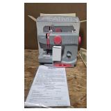 New Janome New Home Sewing Machine in open box.