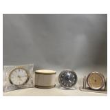 Four vintage alarm clocks