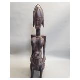 Hand carved wood maternity statue by the Dogon