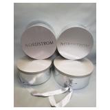 Group of women's hats in Nordstrom boxes