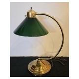 Vintage-style brass arc desk lamp with green