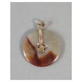 Jade and 14k gold pendant