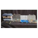 Group of fishing tackle boxes with accessories