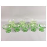 Group of vintage uranium teacups and glass saucers