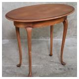Queen Anne-style walnut finish oval side table