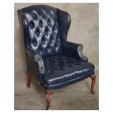 Chesterfield-syle leather tufted wingback arm