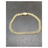 14k yellow gold triple rope chain bracelet. Needs