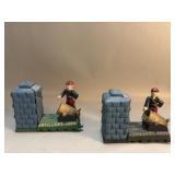 Pair of vintage cast iron mechanical coin bank