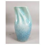 Glazed ceramic vase with a twisted fluted neck