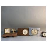 Four electrical alarm clocks