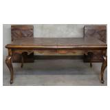 Signed Phyllis Morris walnut dining table with