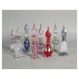 Eight hand blown perfume bottles