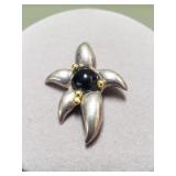Tiffany & Co. Sterling silver, 18k. gold, & onyx