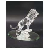 Swarovski crystal lion standing on a rock figurine