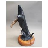 Barclay Hill bronze whale sculpture on a wood