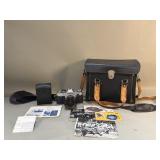 Vintage Canon AE-1 50 mm SLR film camera with