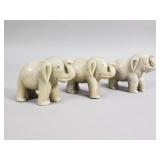 Group of carved stone elephant figurines