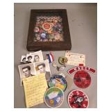 Group of vintage pinback buttons, photos, and