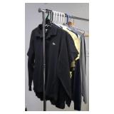 Group of pants, polo shirts, v neck shirts, etc.