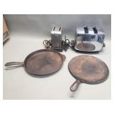 Group of vintage toaster, heater, and cast iron