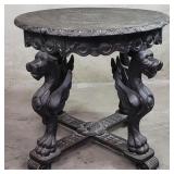 Vintage hand carved ebonized round table with