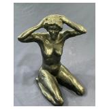 Large metal sculpture of a woman