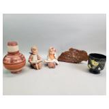 Group of vintage Hummel figurines, petrified wood