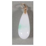 Jade and 14k gold pendant