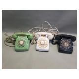 Three vintage rotary telephones