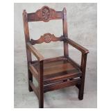 Shaw Furniture Co. carved walnut arm chair