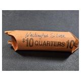 Roll of 40 Washington silver quarter coins.