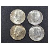 Four 1964 Kennedy silver half dollar coins; 3