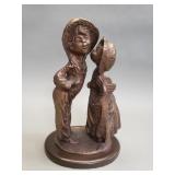 Vintage brass boy and girl figurine